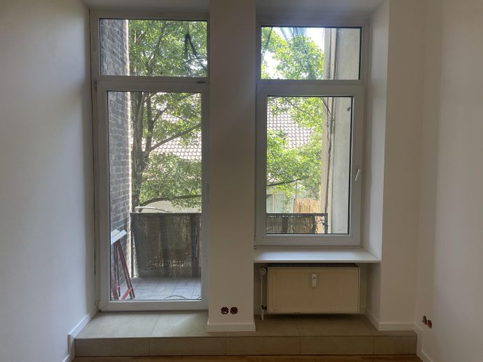 Kernsanierte Fünfzimmerwohnung mit 141 Quadratmetern Wohnfläche in der Innenstadt – Zimmer E mit Balkon