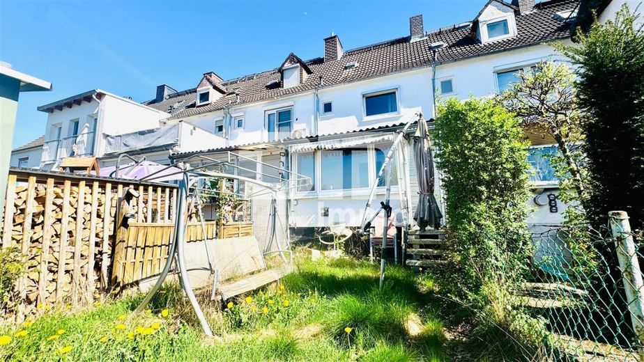 (R)eserveerd! Compact rijtjeshuis op een prominente locatie met tuin – Rückansicht / Gartenbereich