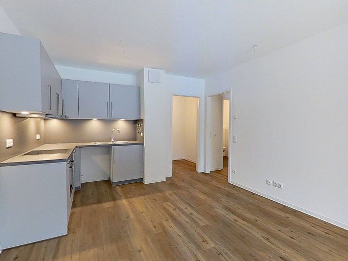 +++Schicke 2-Zimmer-Neubauwohnung mit Balkon im Neubauquartier 'Field 4'+++ – Ansicht II: Wohn- und Esszimm…