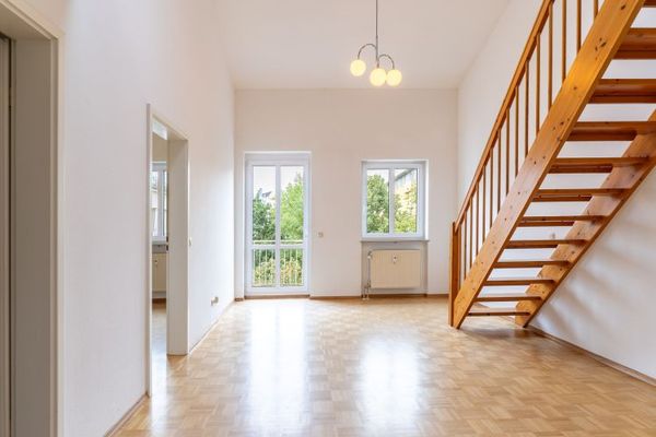 Galerie­wohnung mit stilvollem Raumkonzept und Südbalkon