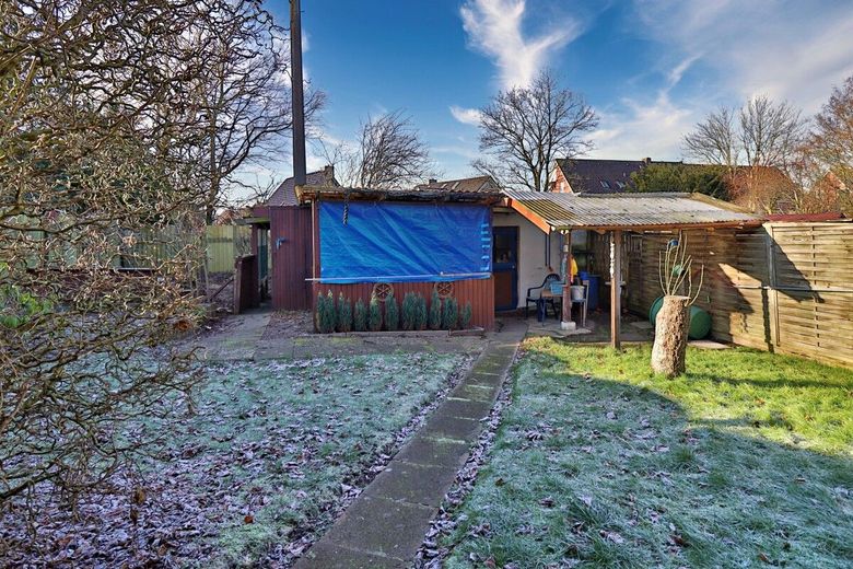 Mehrfamilienhaus mit Ausbaureserve in zentraler Lage von Lunden – Garten