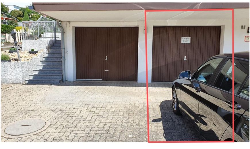 Garage und Stellplatz