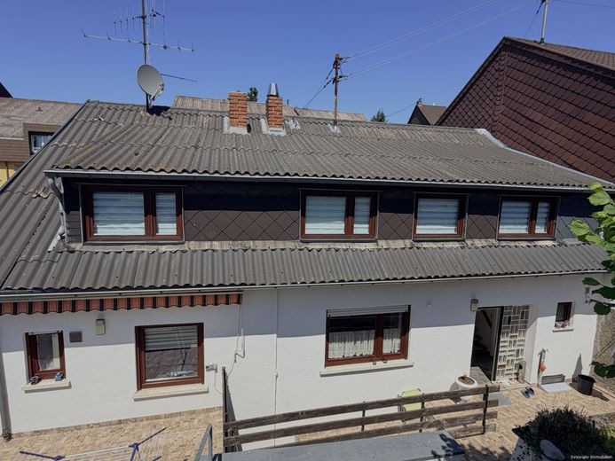 Ein-Zweifamilienhaus in zentraler Lage  mit Gartenweitblick nach Püttlingen – Rückansicht