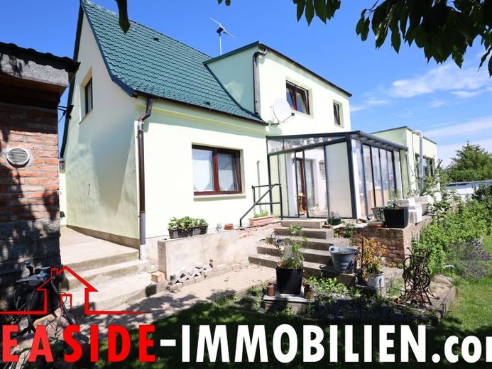 Kröpelin: Curata casa unifamiliare con appartamento indipendente affittato – Foto 1