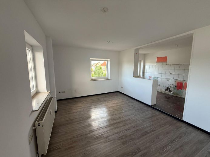 Wohnzimmer mit Küche