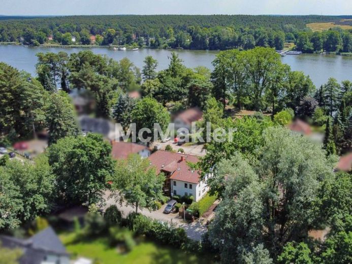Mieszkanie nad jeziorem Krüpelsee: stylowe 3-pokojowe mieszkanie własnościowe z balkonem, miejscem parkingowym i wspólnym pomostem dla łodzi – Zdjęcie 1