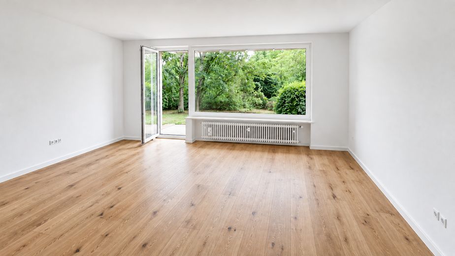 Hochwertig saniert & provisionsfrei: 3-Zimmer-Wohnung mit Südterrasse in München-Solln – Großes Wohnzimmer