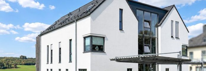 Appartement de jardin moderne, écoénergétique A+, à l’architecture exceptionnelle et offrant une vue sur la vallée de la Gelpe