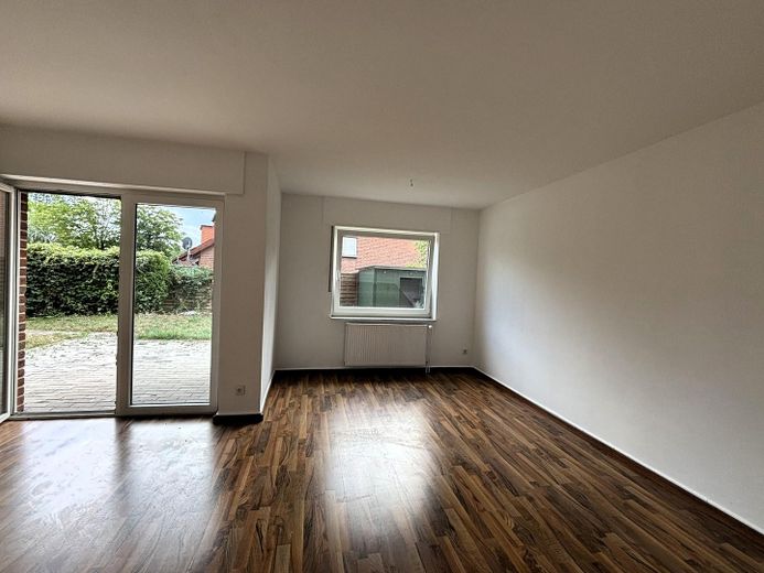 Helle 3-Zimmer-EG-Wohnung mit Terrasse und großem Garten – 48366 Laer – Wohnzimmer