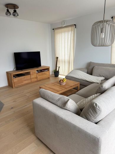 Moderne Neubau-Wohnung für Singles und Paare – Wohnzimmer