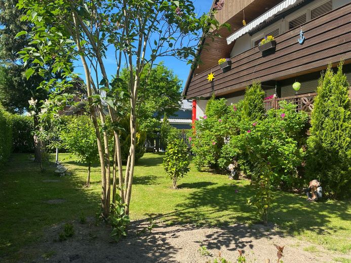 Modernisiertes Einfamilienhaus mit Kamin,Wallbox,bezugsfertig & tollem Wohngefühl – Garten Vorderseite