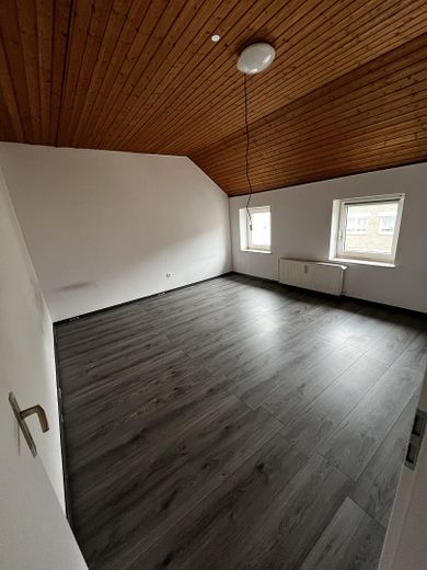 مبنى سكني متعدد الوحدات بعائد 7,7٪ – مؤجّر بالكامل – Wohnzimmer