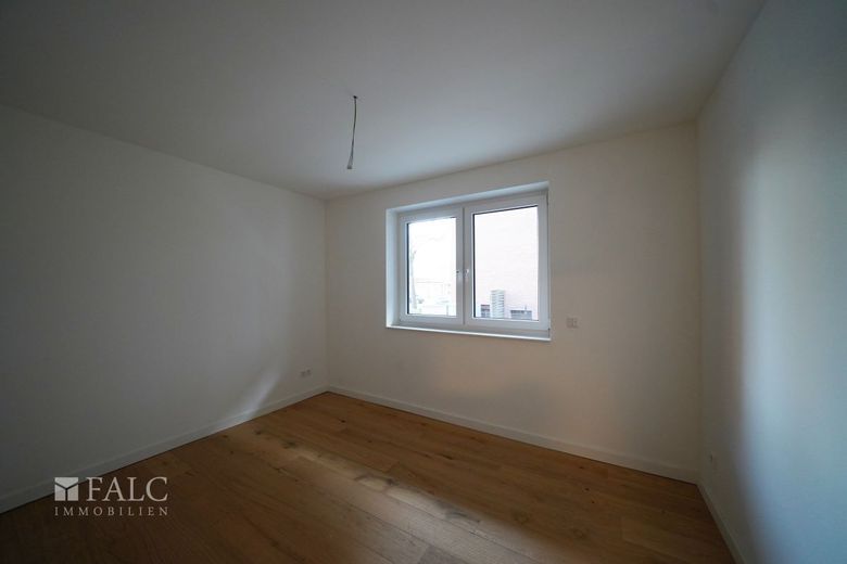 Energieeffizienter Neubau mit 3 Wohneinheiten und Business-Suite – WHG1-Schlafzimmer 3