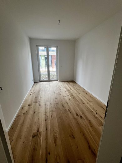 Lichtdurchflutete Neubau-Gartenwohnung mit Terrasse & hochwertiger Ausstattung – Schlafzimmer 2