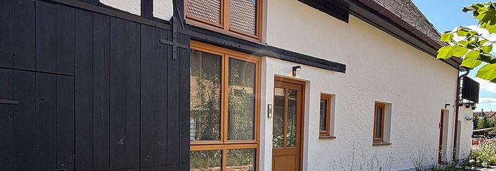 Exclusive ground-floor loft apartment in a listed building | First occupancy after high-quality and sustainable conversion – Zugang Wohnung