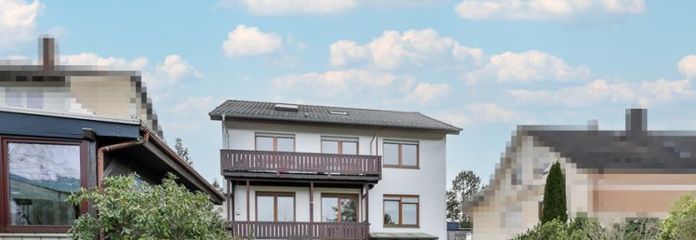 Zwei-/Dreifamilienwohnhaus mit großem Grundstück!