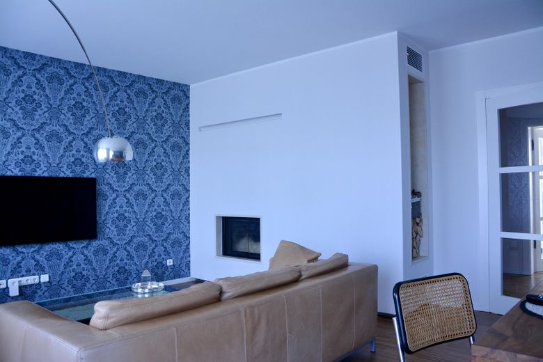 Urbanes Wohnglück in der KTV – Stilvolle 4 Zimmer mit Premium-Ausstattung, mit eigener Wallbox – Wohnzimmer