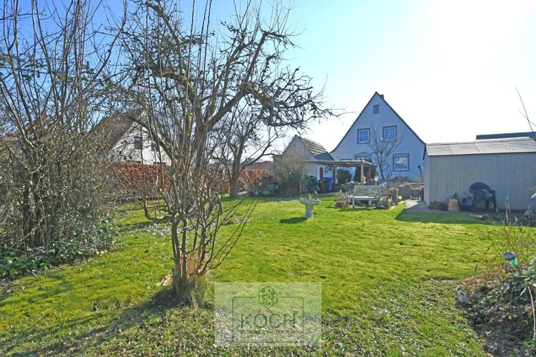 Größtenteils modernisiertes Einfamilienhaus in ruhiger Lage von Langen – Gartenansicht