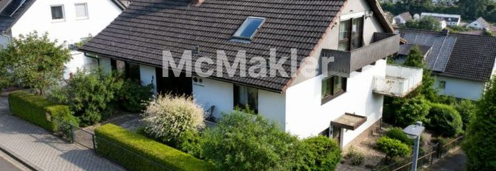 Großzügiges Einfamilienhaus mit vermieteter Einliegerwohnung und Weitblick über Bad Orb
