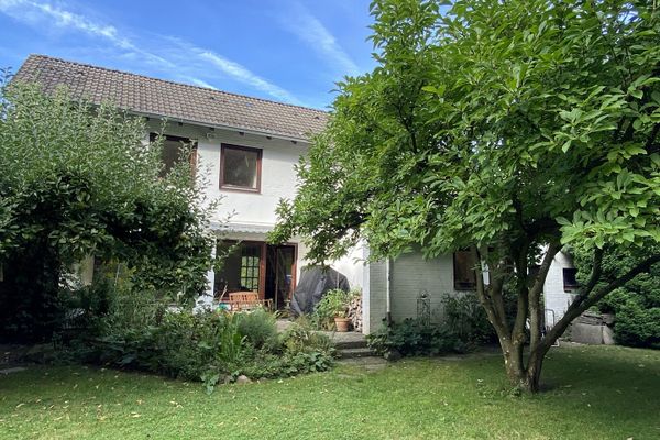 Oase in der Stadt – Einfamilienhaus mit Parkblick