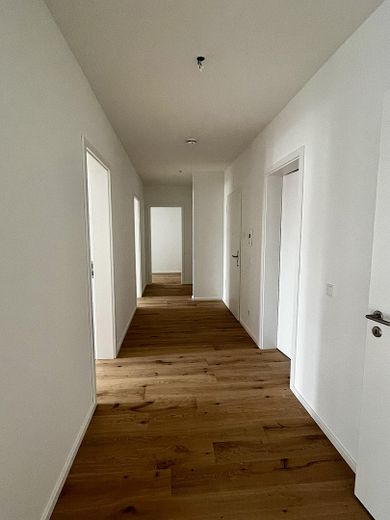 Lichtdurchflutete Neubau-Gartenwohnung mit Terrasse & hochwertiger Ausstattung – Flur