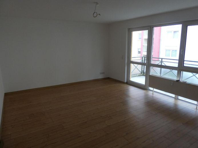 Wohnzimmer mit Balkon