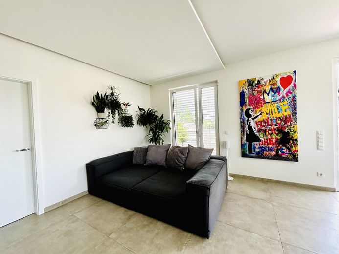 Exclusives Penthouse mit 90 qm Dachterrasse und Bergblick – Wohnen