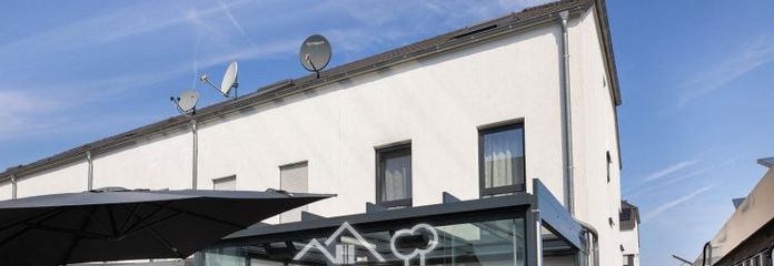 Nuovo prezzo: casa a schiera di testa KfW 55 con veranda invernale a Langenfeld