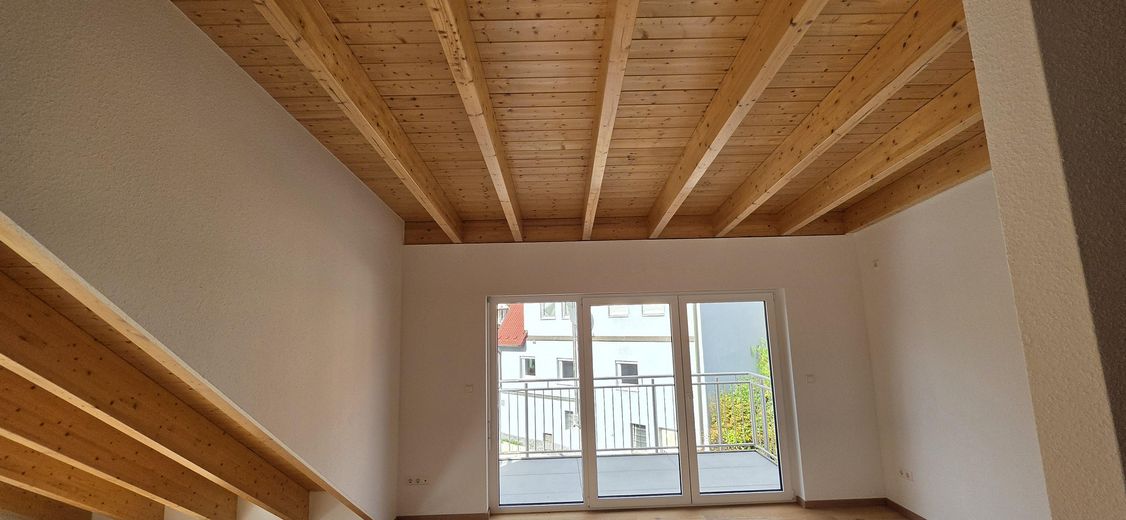Bright 3-room top-floor new-build apartment with a great view – Holzdecke SZ