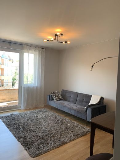 Wohnzimmer mit Balkon