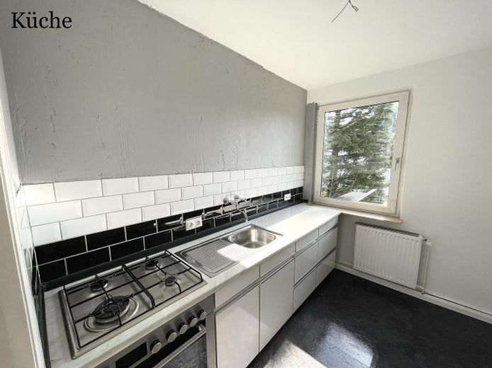 Gepflegte 3-Zimmer-Wohnung mit Balkon und Tageslichtbad nahe der Weser in Bremen-Woltmershausen – Küche