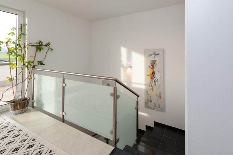 Modernes Wohnen mit Architektur, Komfort und Nachhaltigkeit – Galerie im Staffelgeschoß