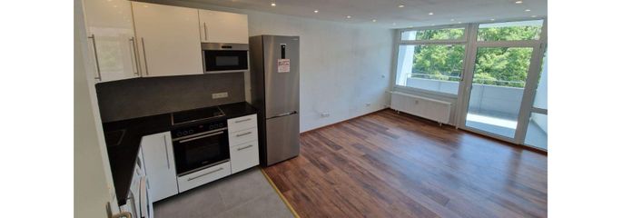 Wohnzimmer mit Küche