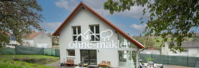 Neuwertiges KfW-55-Einfamilienhaus mit Wintergarten, Weitblick und großem Garten – provisionsfrei