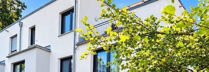 Moderna villetta a schiera di testa con giardino esposto a sud-ovest – Eingang