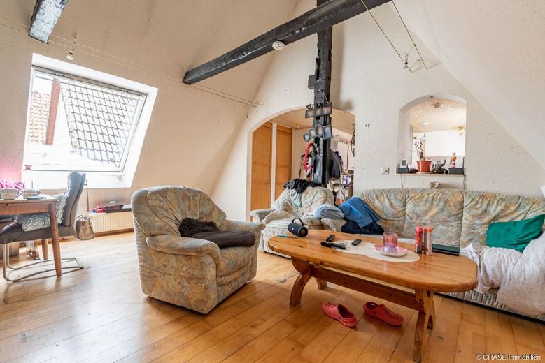 Renditestarkes Mehrfamilienhaus in Blomberg mit TOP-Faktor - zentral, solide und vollvermietet! – DG - Wohnzimmer Ansicht 2