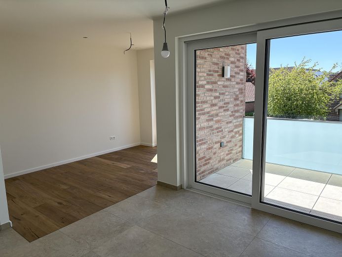 Exklusive 2-Zimmer-Neubauwohnung mit Balkon – Wohnen / Kochen