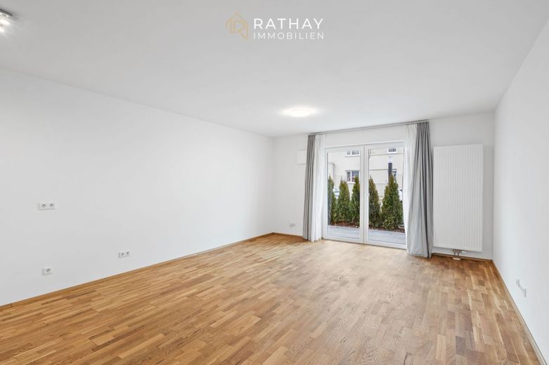 Stadtnah wohnen mit Komfort: 2-Zimmer-Erdgeschosswohnung mit Südterrasse &amp; Tiefgarage – Wohnbereich