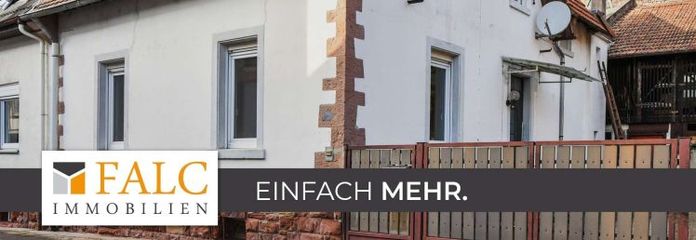 Twee-onder-een-kapwoning met schuur in een renovatiegebied - Verander potentieel in woondromen!