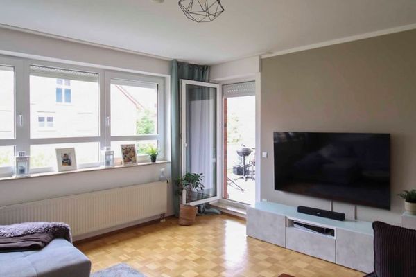 Vivre à Münster Mauritz : appartement soigné de 3 pièces avec balcon, accès au jardin et garage