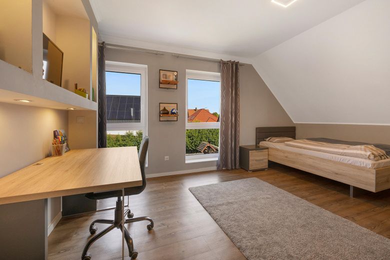 Modernes Einfamilienhaus mit Wintergarten & Terrasse in Haren (Ems) – Kinderzimmer