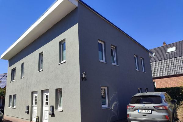 Affascinante casa bifamiliare con due unità abitative separate