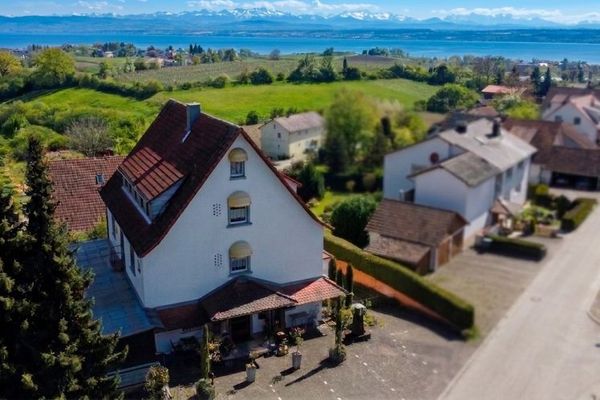 Historisches Mehrfamilienhaus mit Alpen- und Seeblick - vielseitiges Investment mit großem Potenzial
