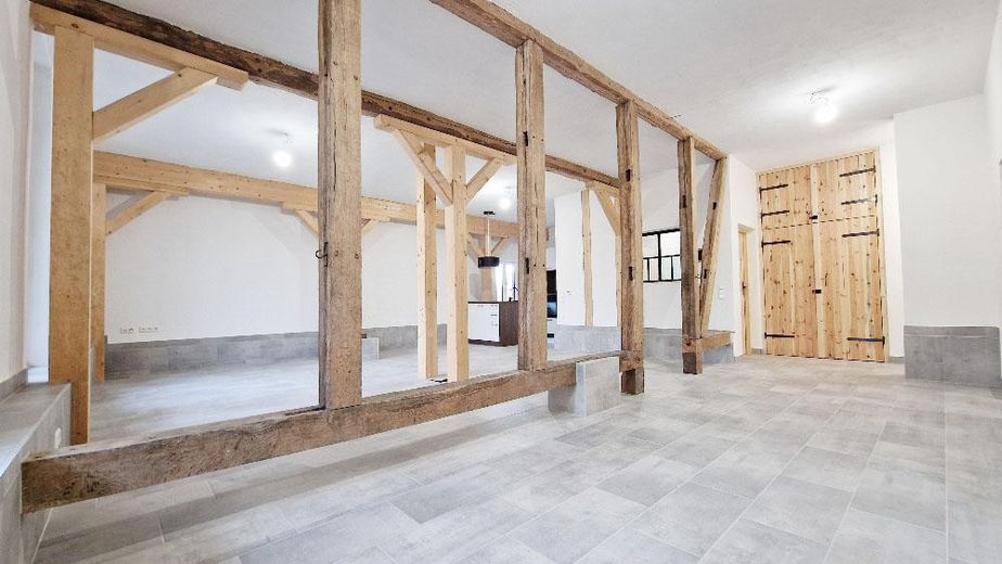 EG Wohnung mit Terrasse | NACHHALTISGTE Immobilie Wolfsburgs, Lehmbau, PV - Autarkie, Appsteuerung – Wohn - und Essbereich