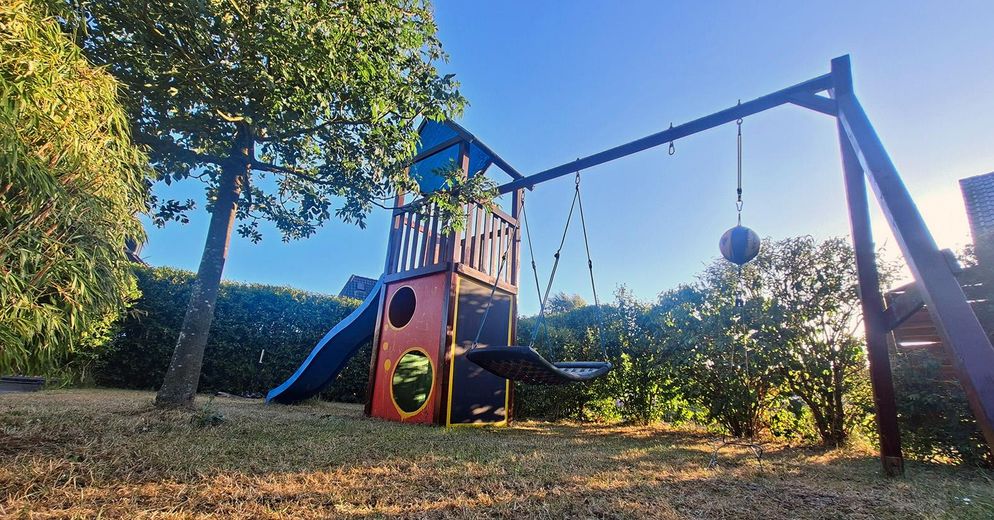 Two-family house – quiet and central with a garden paradise – Garten