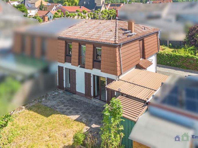 Wohnen in Frei-Weinheim – attraktive Doppelhaushälfte mit Garten und Carport – Foto 1