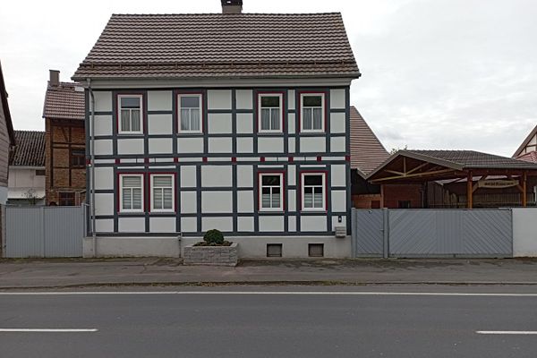Recently renovated farmhouse with remaining farm buildings