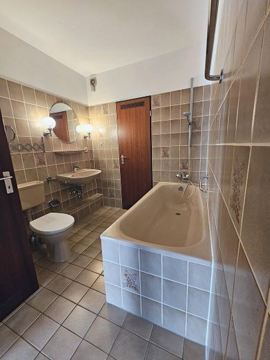 Zentrale 1-Zimmer-Wohnung mit Sonnenterasse in Willich – Bad