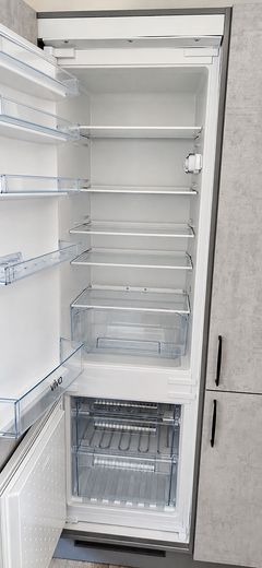 Helle Wohnung mit großzügigem Wohnbereich, Einbauküche, Balkon und eigener Garage – Foto 12