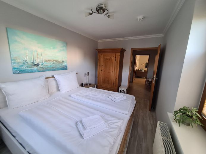 Lichtdurchflutete 3-Zi.-EG-Wohnung in Strandnähe in Pelzerhaken – Kleines Schlafzimmer